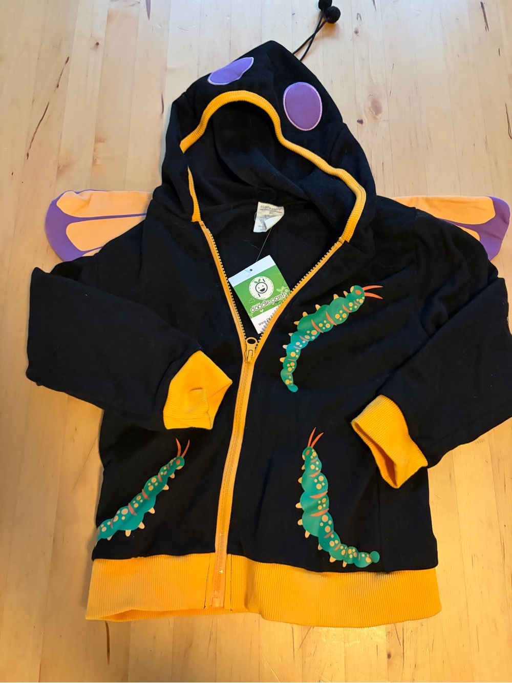 Doodle Pants Black Hoodie with Yellow Trim and Green Caterpillar Graphics